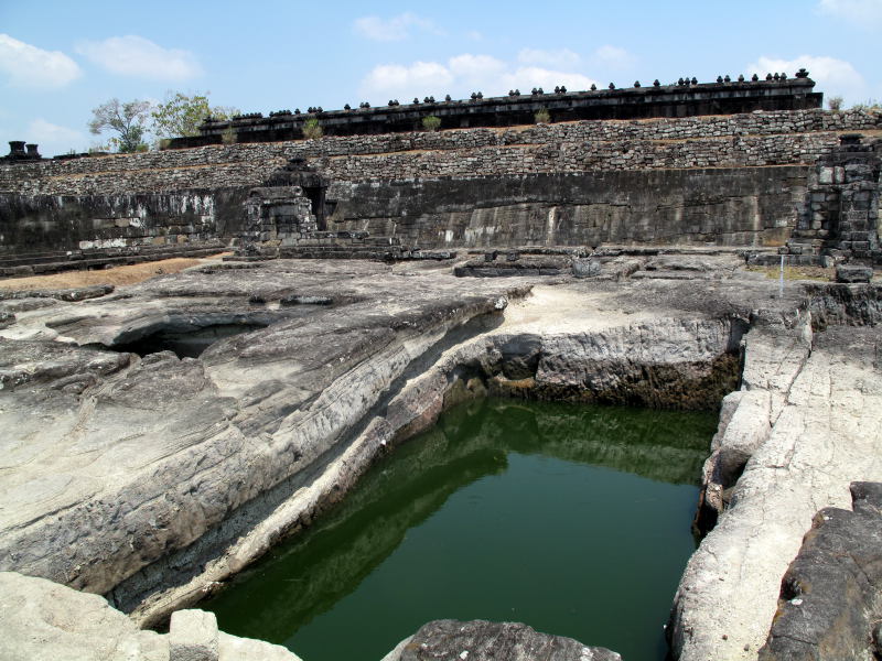 The rectangular pool with the pendopo in the background