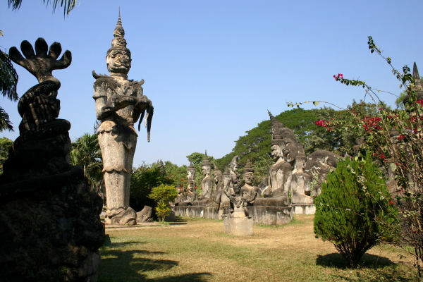 A giant walking figure in the Buddha Park