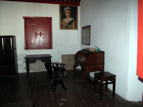 An office with old portrait of Queen Elizabeth