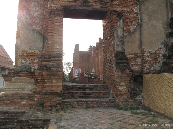 Looking through the door of the old prayer hall to the altar