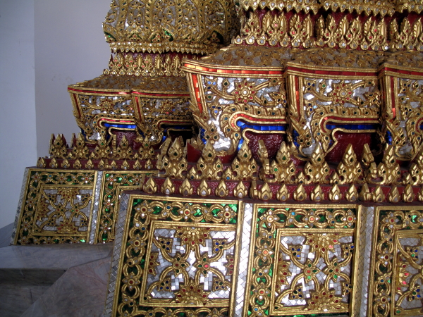 Ornate mirror and gilt base of the Buddha image of the main tower.