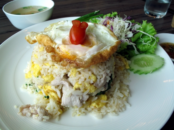 A simple meal of pork fried rice, with a bunny on top