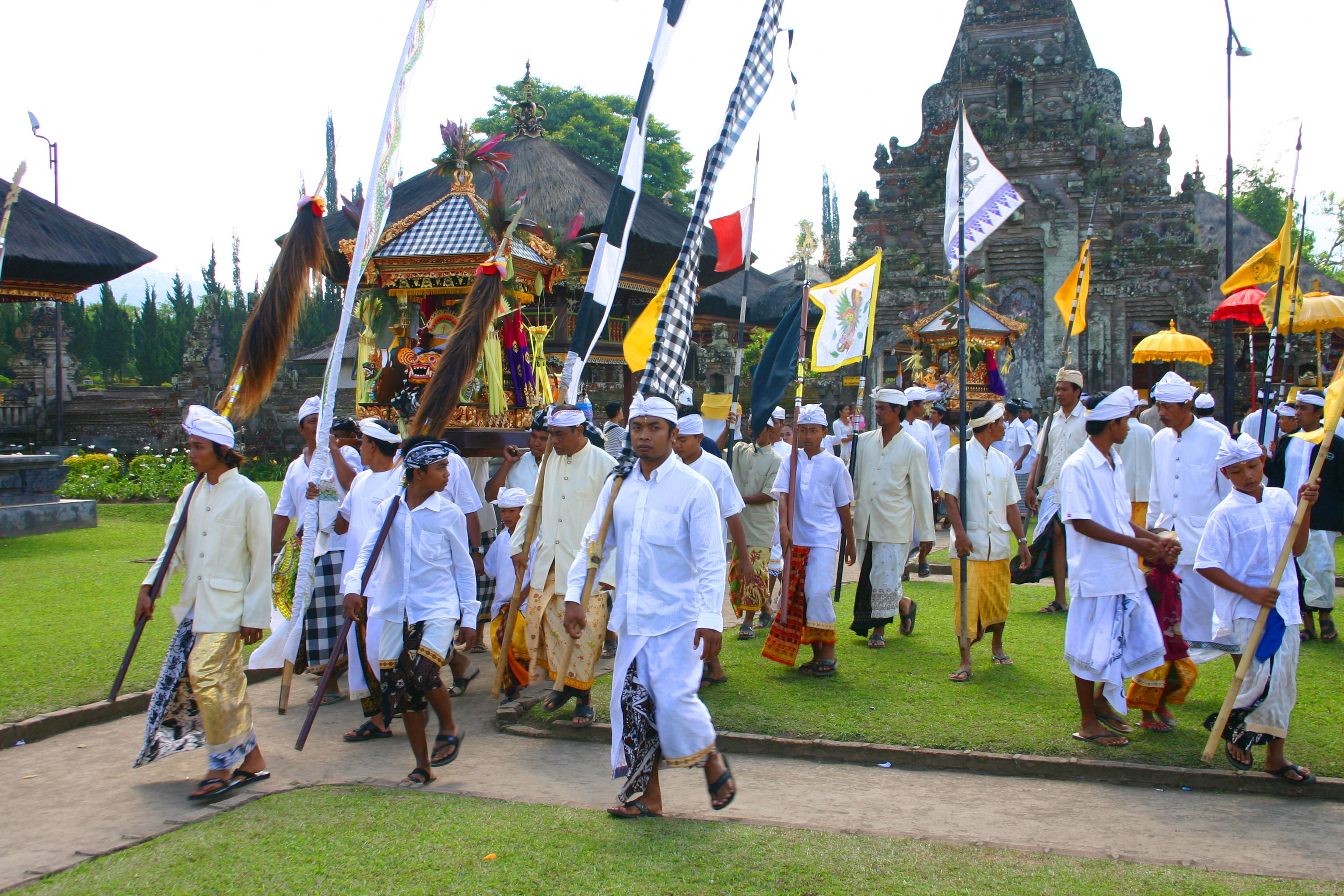 A procession carrying the gods out of the temple