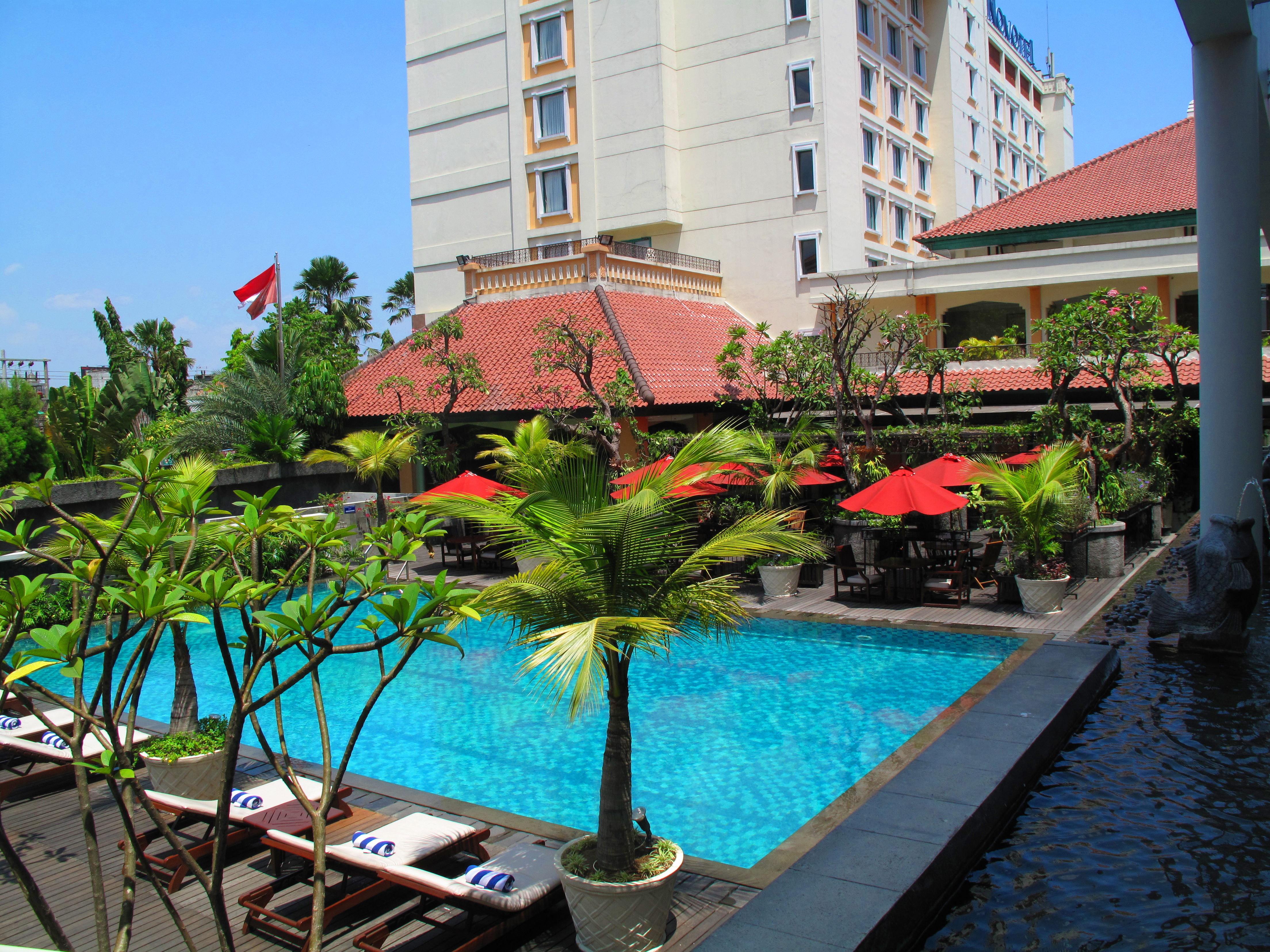 The swimming pool of the Ibis Solo, with the Novotel in the background