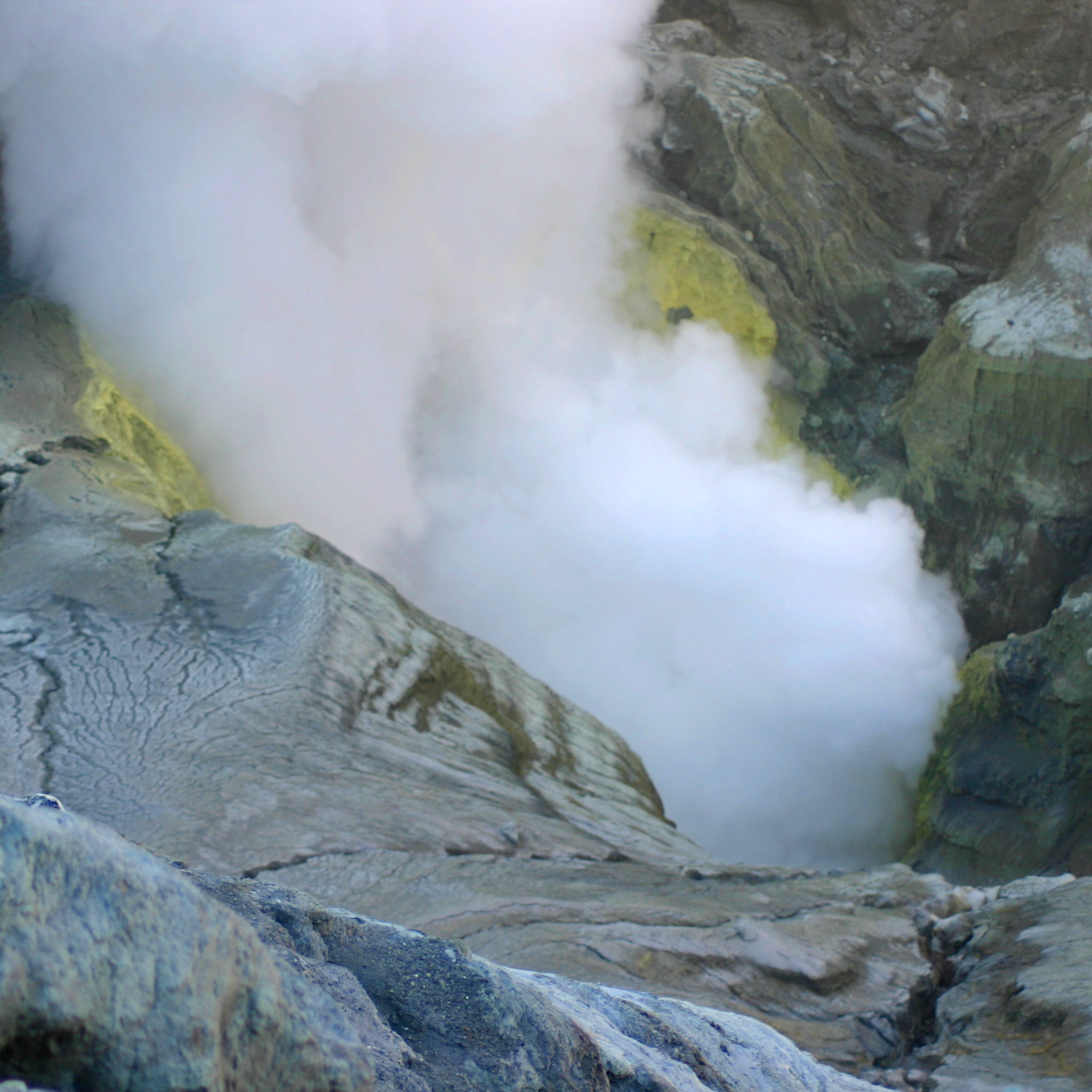 The vent of Mount Bromo, lined with sulfur.