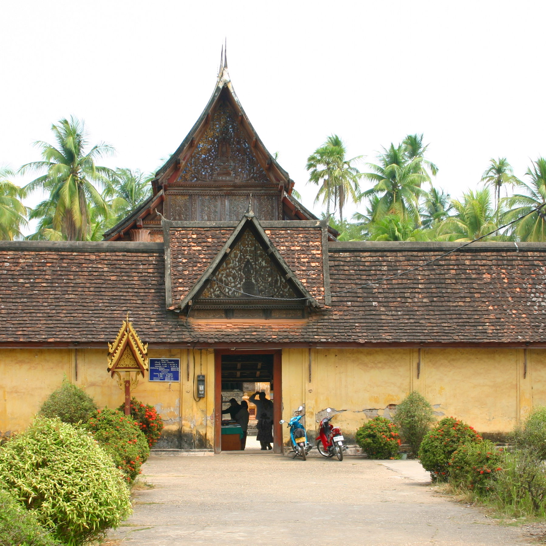 The entrance to the cloister of Wat Sisaket, with the ordination hall rising above in the center