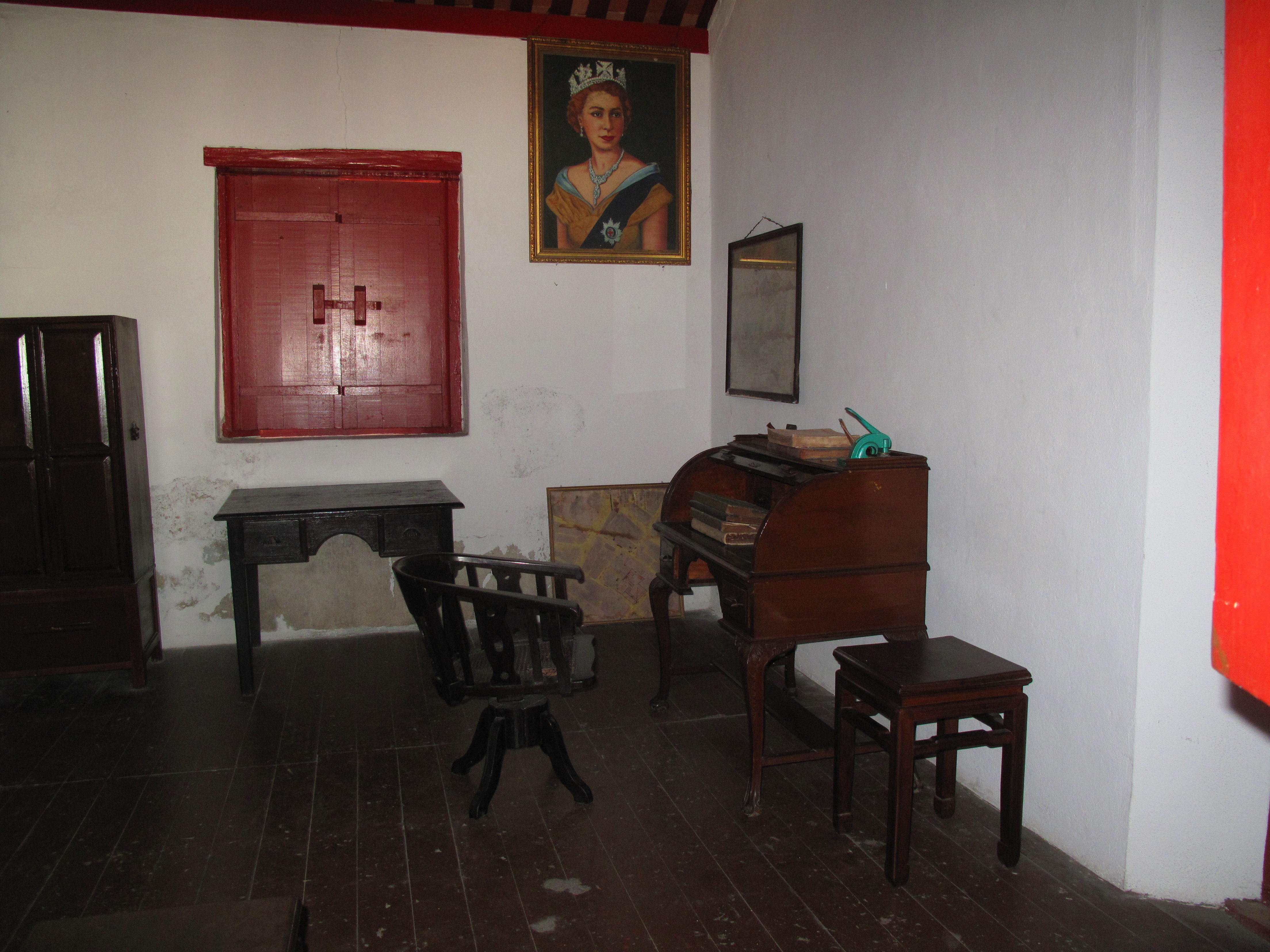 An office with old portrait of Queen Elizabeth