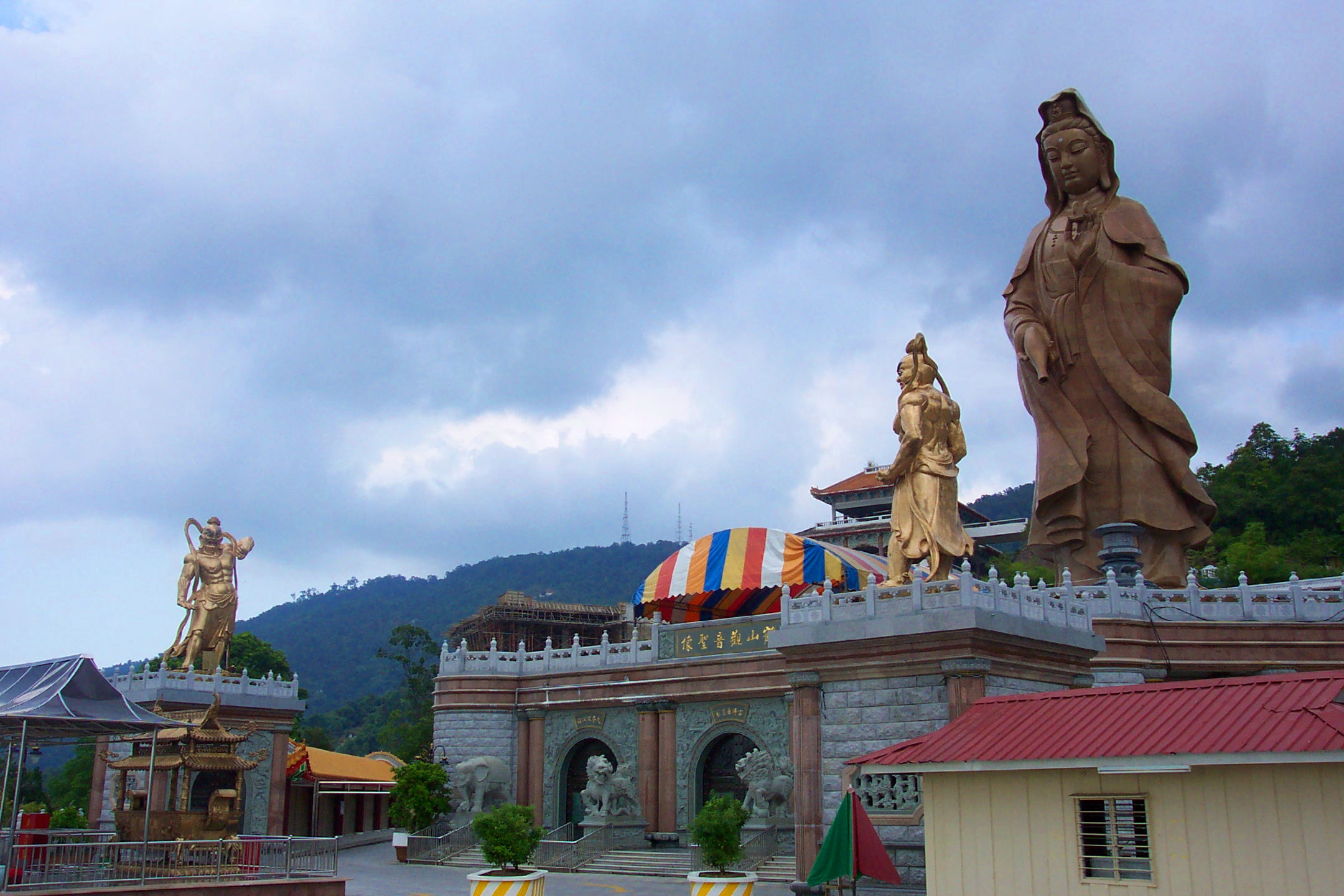 The giant statue of Kuan Yin, along with others